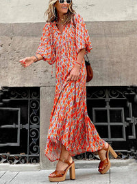 Ingrid - Lockeres Maxikleid mit Puffärmeln in Orange
