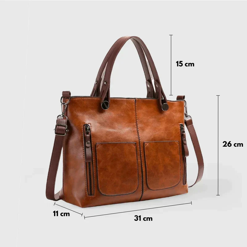 Elegante Handtasche aus hochwertigem pflanzlich gegerbtem Leder mit doppelten Fächern und Vintage-Charme