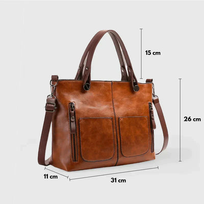 Elegante Handtasche aus hochwertigem pflanzlich gegerbtem Leder mit doppelten Fächern und Vintage-Charme