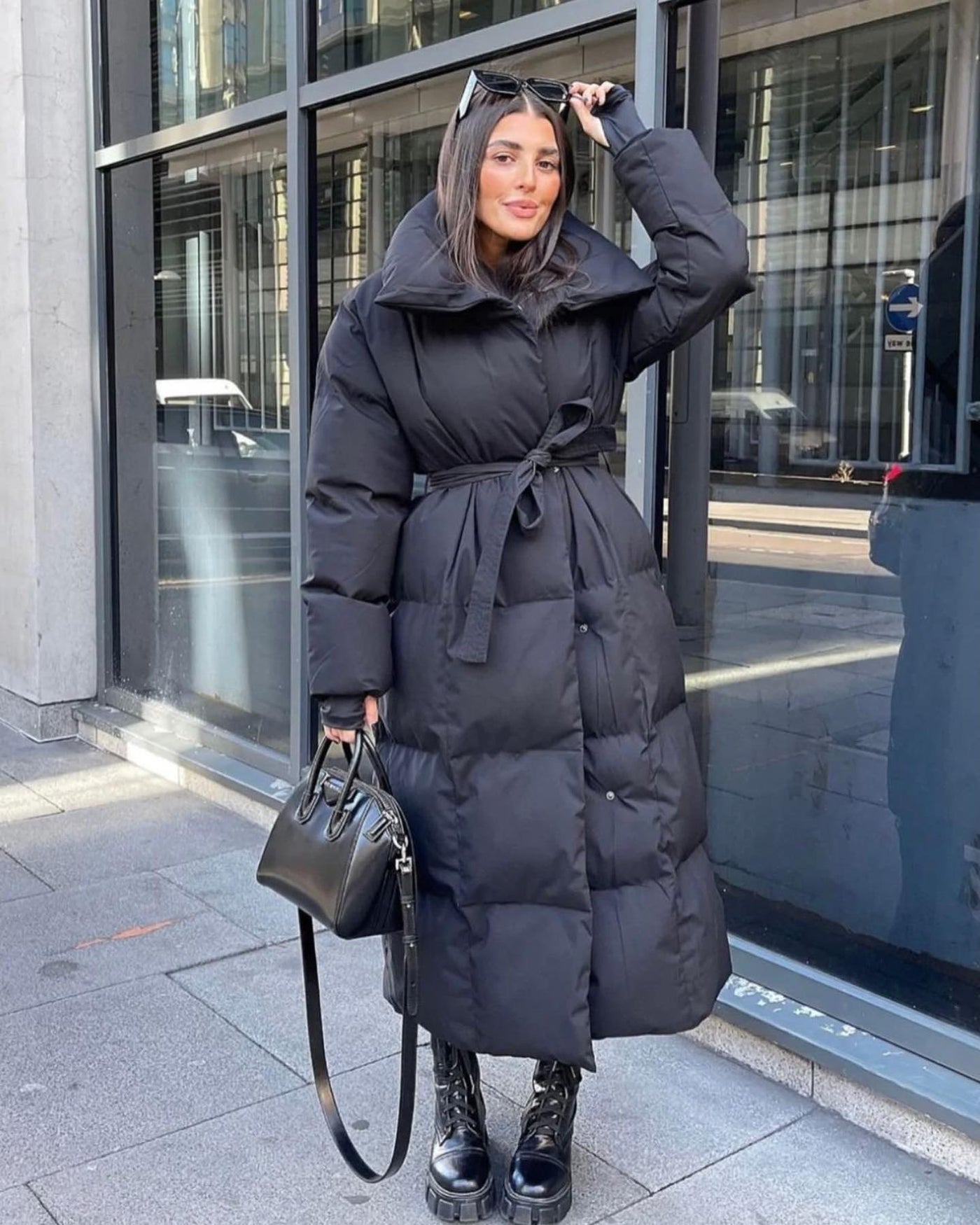 Elegante, lange und warme Damenjacke