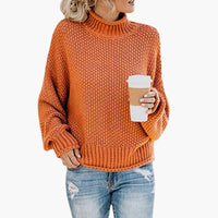 Damen pullover mit hohem Halsausschnitt und geripptem Saum in Orange