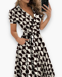 Damen Elegantes Kleid mit Gürtel | Midi in Schwarze und weiße Kreise