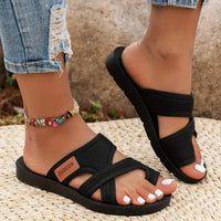 Celia | Gleitsandalen aus perforiertem Mesh in Schwarz