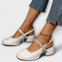 Celandra - Mary Janes mit Glitzer-Riemen und Blockabsatz in Weiß