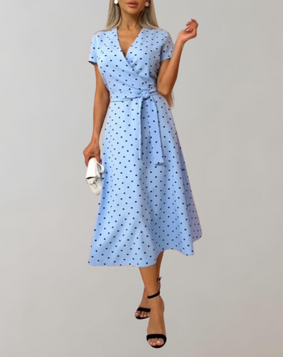 Gabriella - Hellblaues Midikleid mit schwarzen Punkten | Kleid im Retro-Wickeldesign