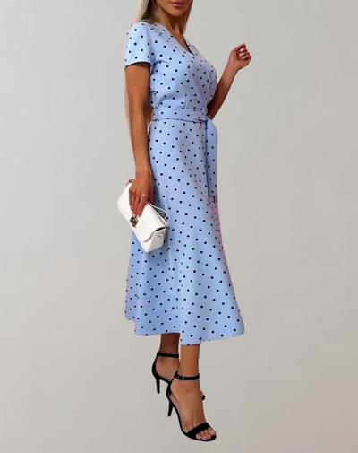 Gabriella - Hellblaues Midikleid mit schwarzen Punkten | Kleid im Retro-Wickeldesign