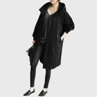 Damen Langer Wasserabweisender Kapuzen-Trenchcoat Weite Passform Eleganter Wetterschutz in Schwarz