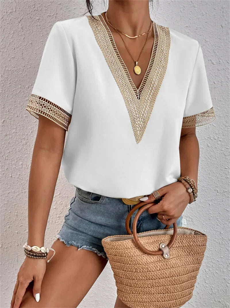 Damen Sommerbluse mit V-Ausschnitt und bestickten Details
