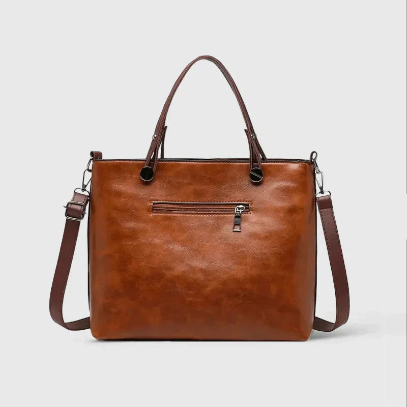 Elegante Handtasche aus hochwertigem pflanzlich gegerbtem Leder mit doppelten Fächern und Vintage-Charme
