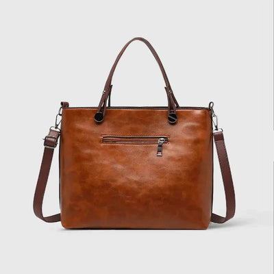 Elegante Handtasche aus hochwertigem pflanzlich gegerbtem Leder mit doppelten Fächern und Vintage-Charme