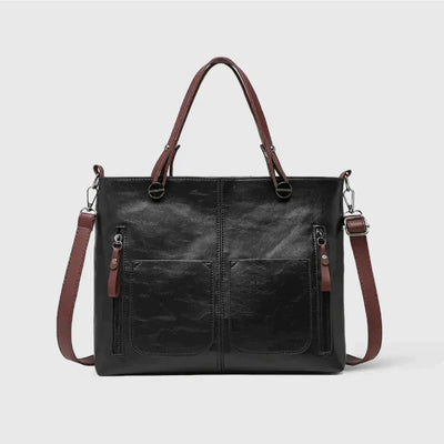 Elegante Handtasche aus hochwertigem pflanzlich gegerbtem Leder mit doppelten Fächern und Vintage-Charme