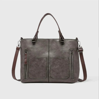 Elegante Handtasche aus hochwertigem pflanzlich gegerbtem Leder mit doppelten Fächern und Vintage-Charme