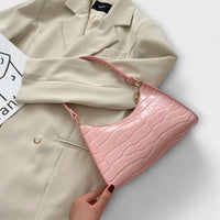 Brava - Glänzende Ledertasche in Pink