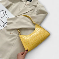 Brava - Glänzende Ledertasche in Gelb