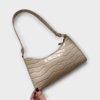 Brava - Glänzende Ledertasche in Beige