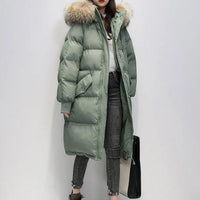 Lange Puffer Winterjacke mit Fell in Grün