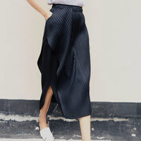 Damen Plissierter Midi-Rock mit asymmetrischem Saum Nord Taschen in Schwarz