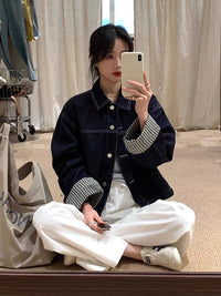 Damen Oversized Jeansjacke mit kontrastiertem Karo-Futter und Umschlagmanschetten Nord Taschen in Schwarzblau