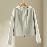 Damen Kapuzen-Softshelljacke mit Zwei-Wege-Reißverschluss und ergonomischer Schnitt Nord Taschen in Beiger Mantel