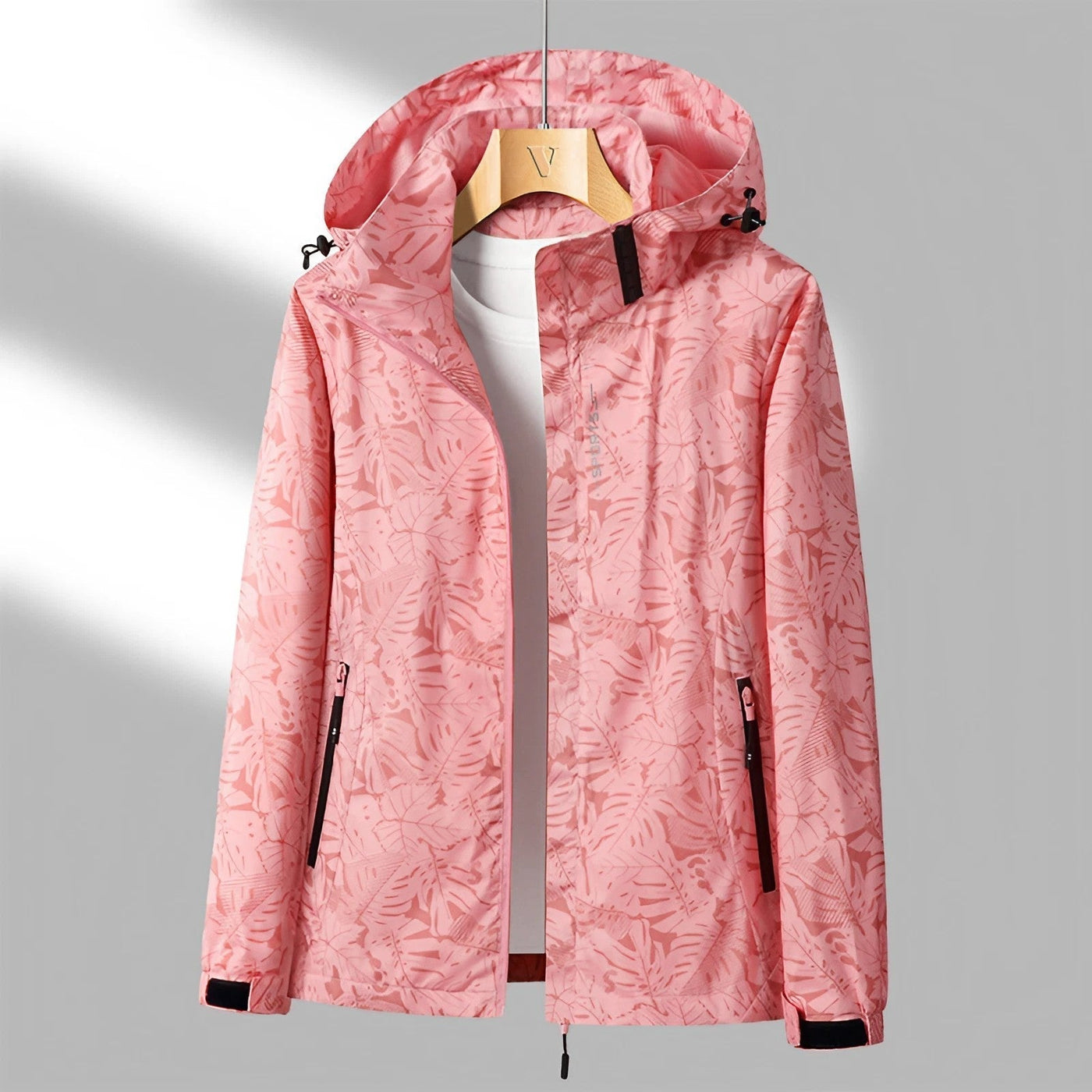 Damen Windjacke mit Kapuze – Leichte, wasserdichte Outdoor-Jacke mit floralem Print in Blau oder Rosa