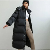 Abigail – Lange Pufferjacke mit hohem Kragen für Damen | Ultrawarmer, langer Steppmantel in Schwarz