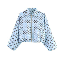 Damen Cropped Bomberjacke mit Ballonärmeln, elastischem Saum und Reverskragen Nord Taschen in Hellblau gepunktet