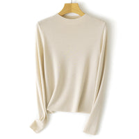 Damen Feinstrick-Pullover mit kurzem Stehkragen und schmaler Silhouette Nord Taschen in Aprikose-Beige
