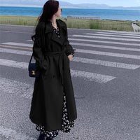 Damen Langer Oversize-Trenchcoat mit Ballonärmeln und Bindegürtel Nord Taschen in Schwarz