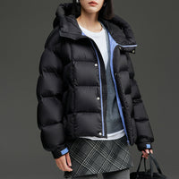 Damen Kurze Boxy‑Steppjacke mit Oversize‑Ärmeln, hohem Thermokragen und Kapuze Nord Taschen in Schwarzblau