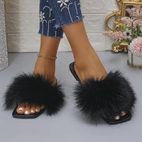 Damen Flausche Pantoletten in Schwarz