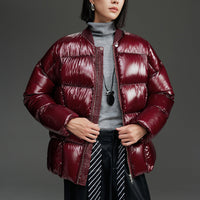 Damen Kurze gestepptte Daunenjacke mit glänzender Shell und Boxy-Silhouette Nord Taschen in MAX-Rot