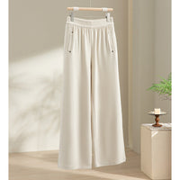 Damen Weite Satin-Loungehose mit elastischem Bund und Eingrifftaschen Nord Taschen in Beige-Apricot Hose