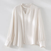 Damen elegante oversized Bluse mit asymmetrischem V-Ausschnitt und Manschetten Nord Taschen in Cremeweiß