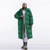 Abigail – Lange Pufferjacke mit hohem Kragen für Damen | Ultrawarmer, langer Steppmantel in Grün