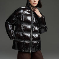 Damen Kurze gestepptte Daunenjacke mit glänzender Shell und Boxy-Silhouette Nord Taschen in Tiefschwarz