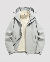 Unisex wasserdichte Softshell-Allwetterjacke mit herausnehmbarer Fleece-Innenjacke und Kapuze in Kieselgrau
