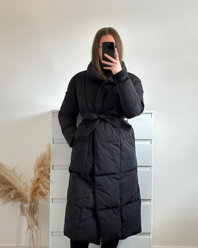 Elegante, lange und warme Damenjacke