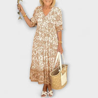 Caitlin - Anmutiges Blumenkleid mit einem luftigen Design in Beige