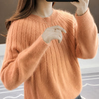 Taimi - Ein natürlicher und eleganter Damenpulli in Orange