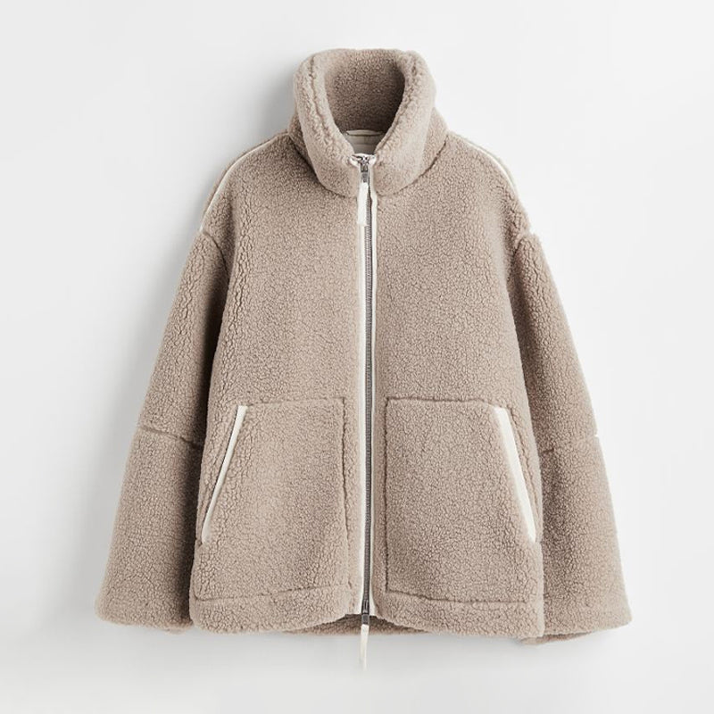 Stylische und kuschelige Sherpa Jacke für kalte Tage