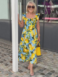 Limone – Sommerkleid mit Zitronenprint in Blau und Gelb