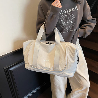 Umhängetasche für Frauen aus sportlichem und strapazierfähigem Stoff - Miranda