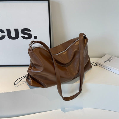 Damen-Umhängetasche mit Ledereffekt im fließenden Stil - Léa