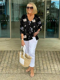 Frida | Florale Bluse mit V-Ausschnitt in Schwarz