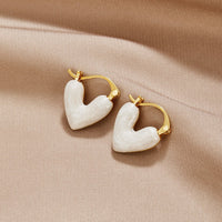 Reine Herz Ohrringe in 18K Gold