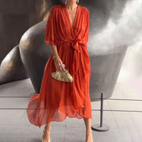 Losfallende Maxi-Kleid mit V-Ausschnitt – Elara in Orange