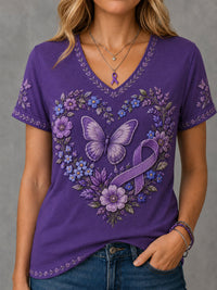 Damen-T-Shirt in Lila mit Blumen- und Schmetterlingsmuster zur Sensibilisierung für Alzheimer, V-Ausschnitt in Lila