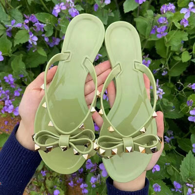 Nikki® | Flip-Flops-Sandalen mit Schleife und Nieten